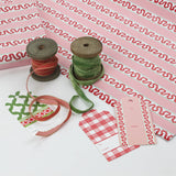 Pink/Red wrapping paper in fancy stripe patterns