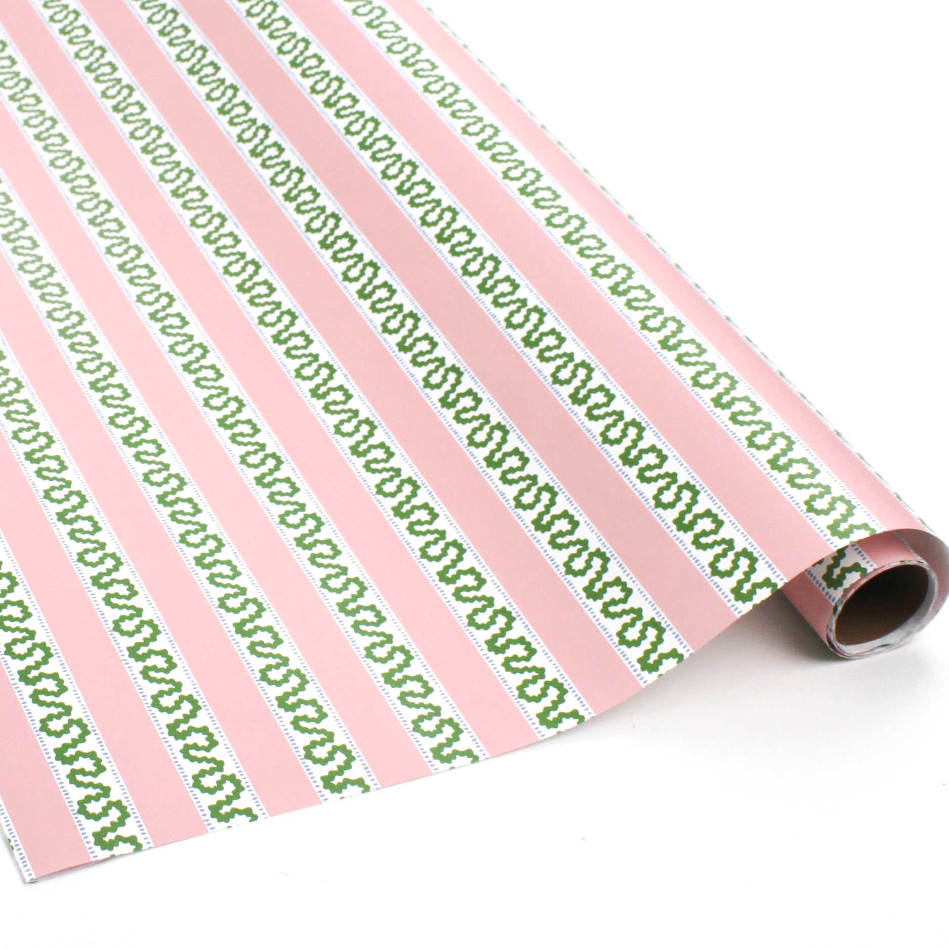 Pink and green striped Christmas wrapping paper roll with decorative pattern.