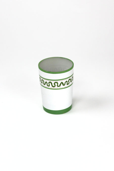 a green painted glass with a squiggly motif at the top called "Harbor Trail" by madcap cottage