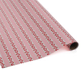 red and pink striped wrapping paper in fancy stripe patterns