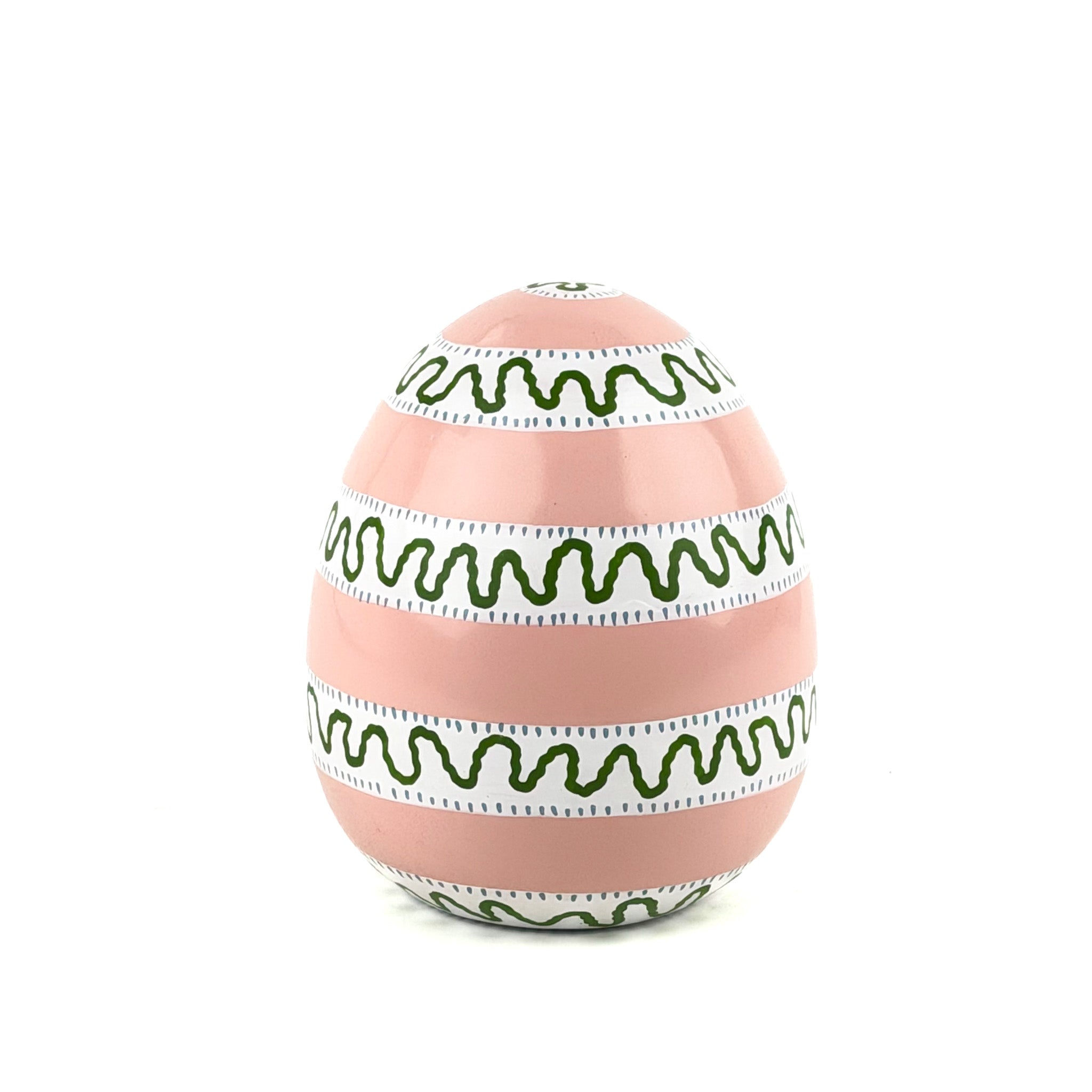 A white, green and pink striped decorative Easter egg with on white background.