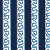 A navy and white striped fabric with a wiggly centre stripe down the white stripes with red dashes on either side. 