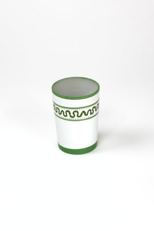 a green painted glass with a squiggly motif at the top called "Harbor Trail" by madcap cottage