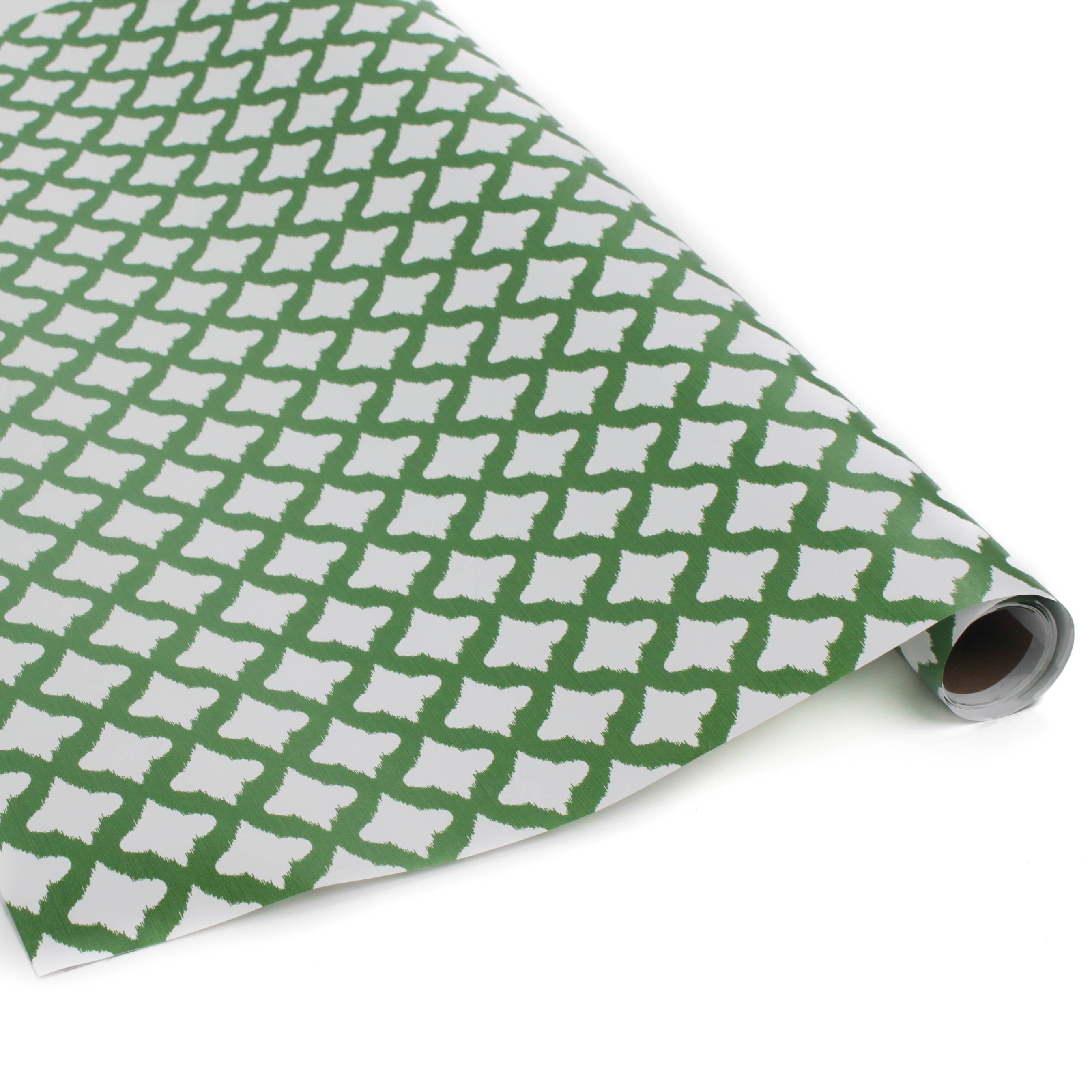 Roll of lattice print green and white wrapping paper