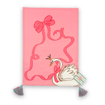 pink christmas tea towel featuring a large swan and pink ribbon design and blue and pink tassels with a madcap cottage card on the side bottom