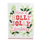A Madcap Cottage Christmas tea towel with holly motifs and text that reads Have a Holly Jolly Christmas