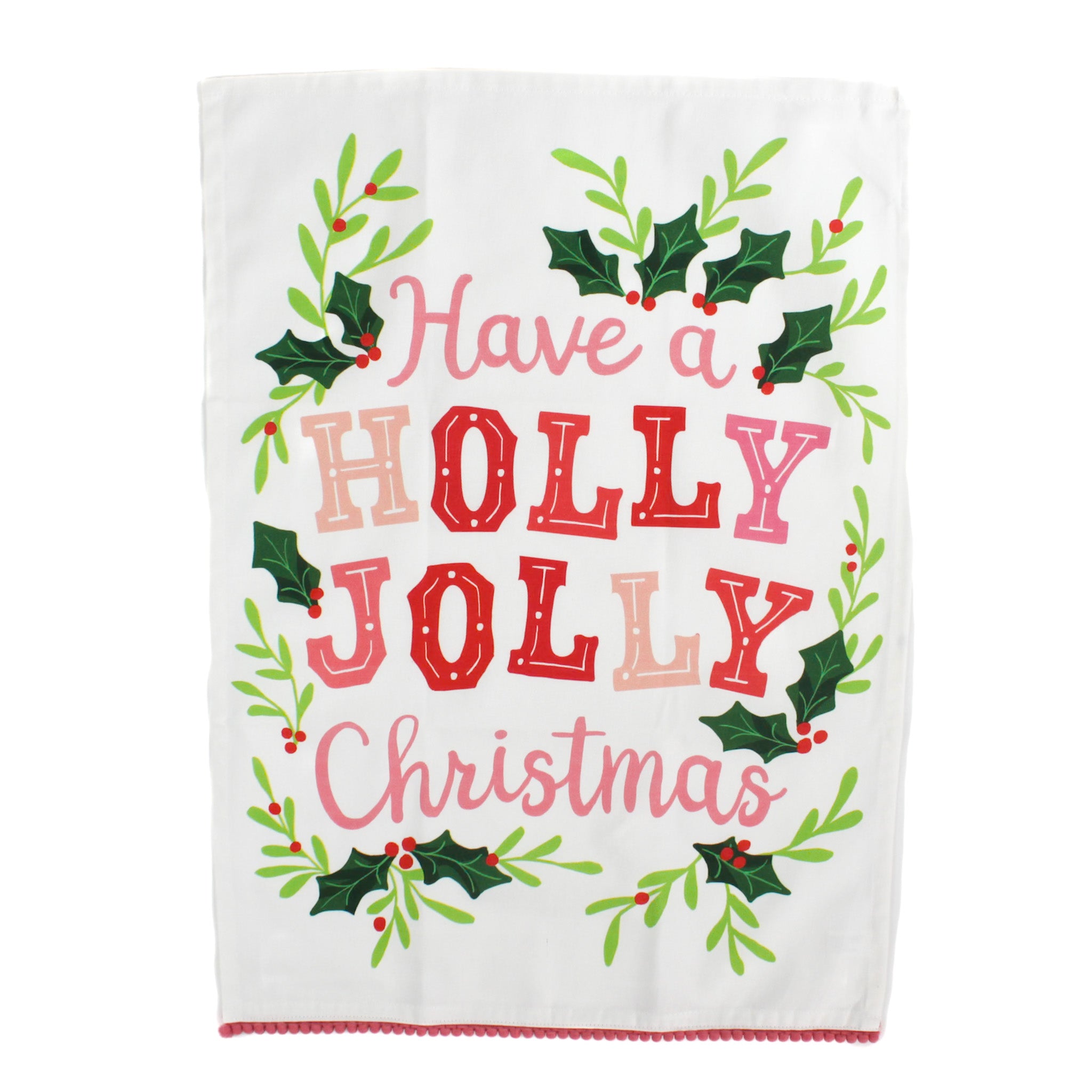 A Madcap Cottage Christmas tea towel with holly motifs and text that reads Have a Holly Jolly Christmas