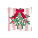 White and pink striped christmas pillow with holly design and red bow on a white background.