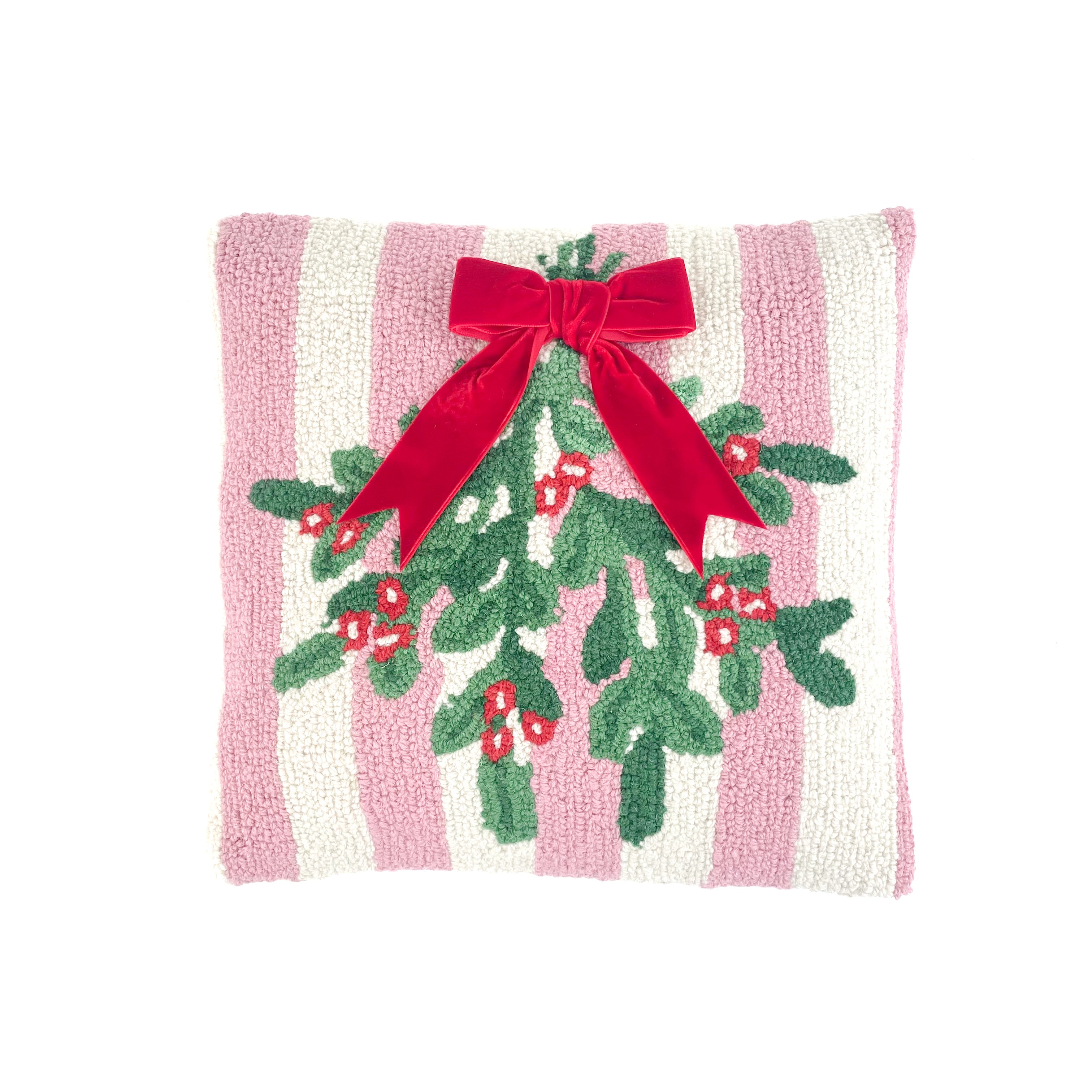 White and pink striped christmas pillow with holly design and red bow on a white background.