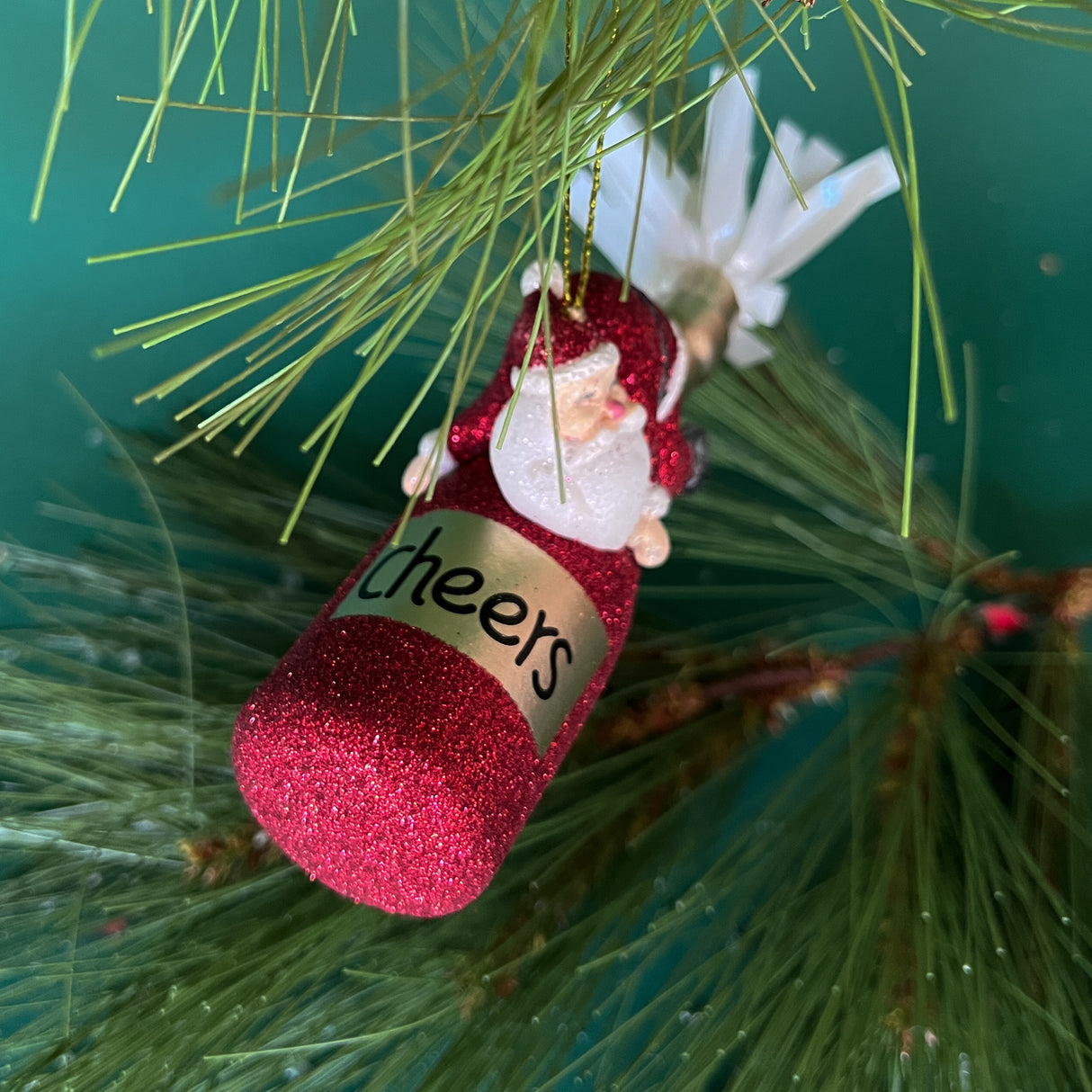 Glitter Santa Riding Champagne Christmas Ornament