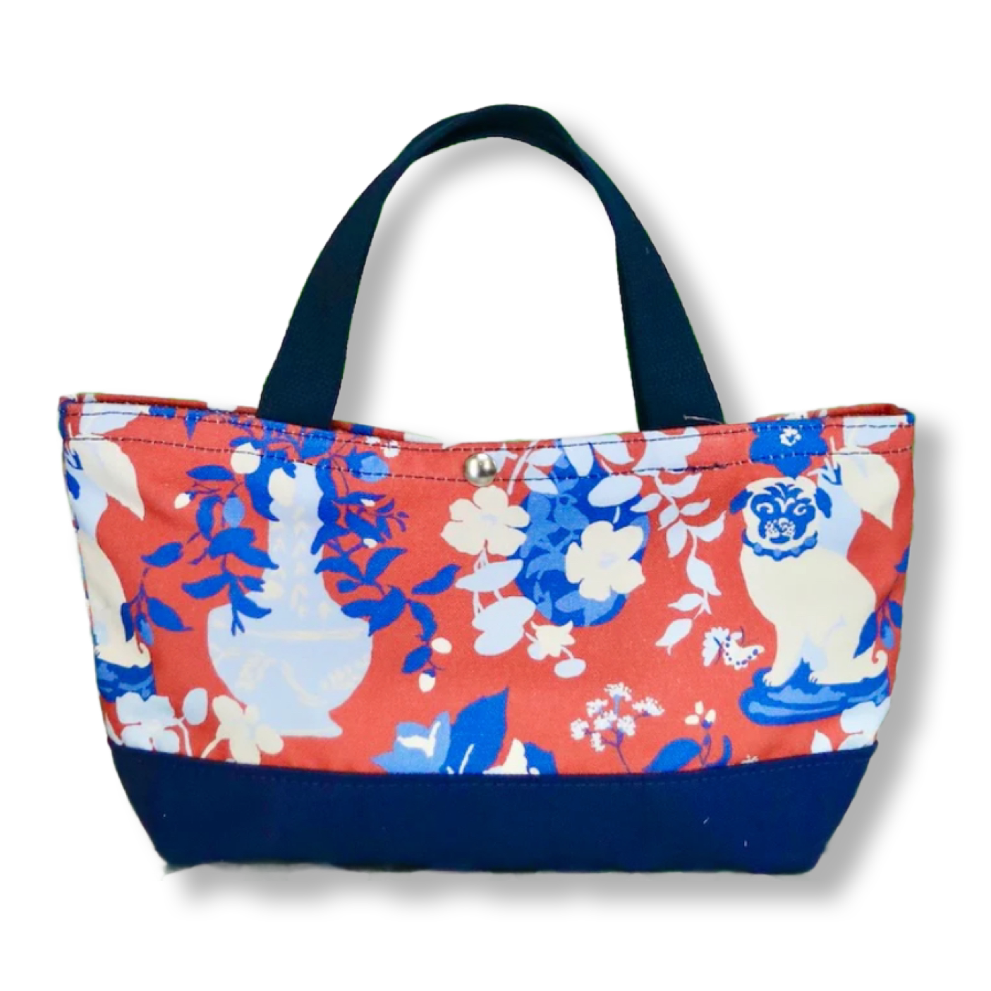 a small Imperial Palace canvas tote bag, in a red, white and blue chinoiserie pattern featuring white pug dogs