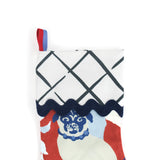 Red and Blue Chinoiserie Christmas stocking with a pug design on a white background