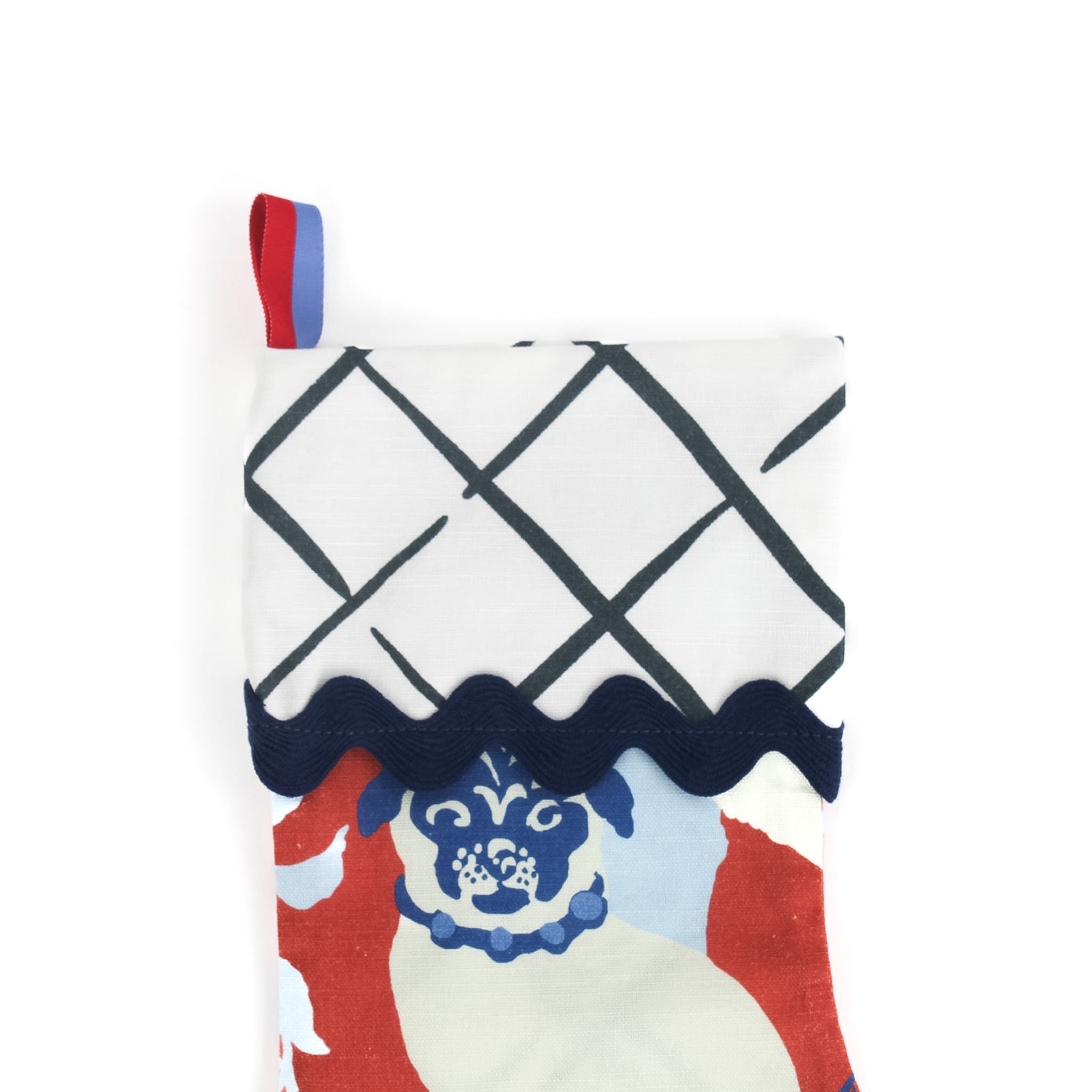 Red and Blue Chinoiserie Christmas stocking with a pug design on a white background