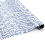 Roll of blue and white wrapping paper with a bamboo trellis design on a white background