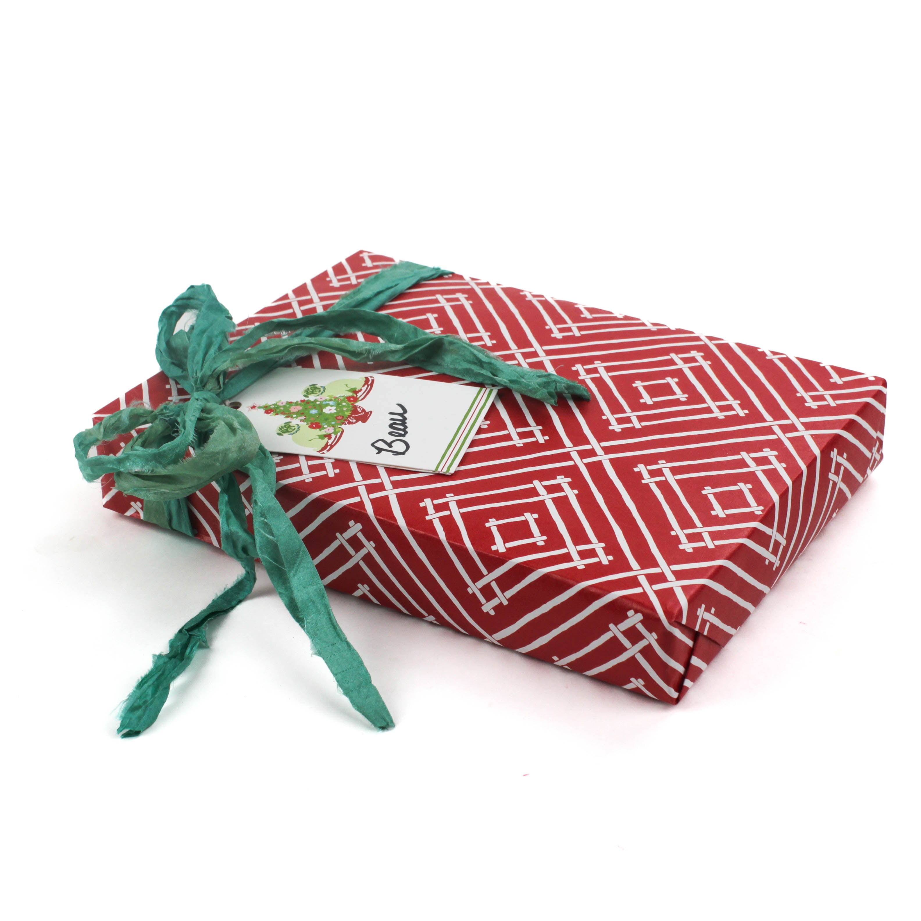 a wrapping paper with a geometric lattice pattern in red