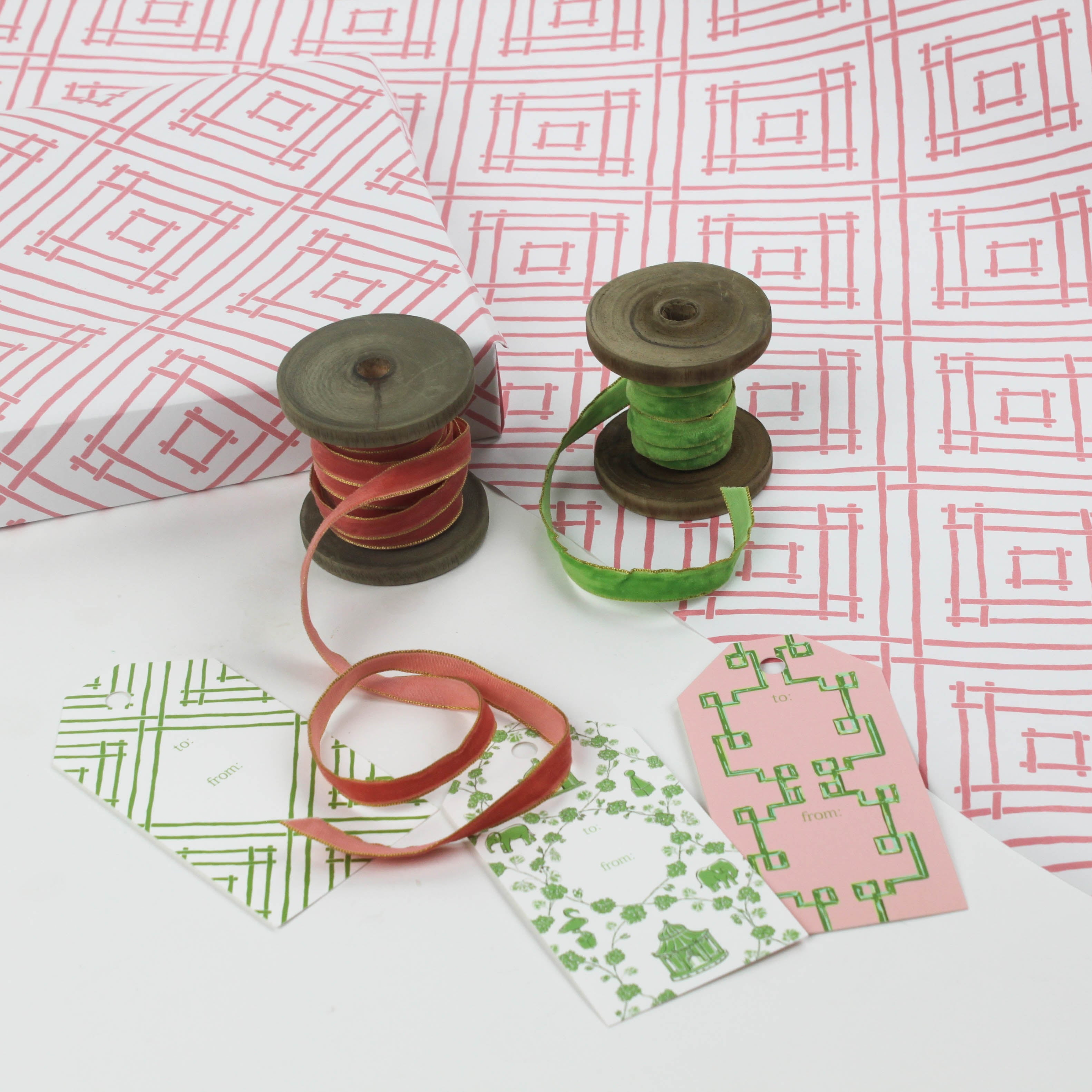 a wrapping paper with a geometric lattice pattern in pink