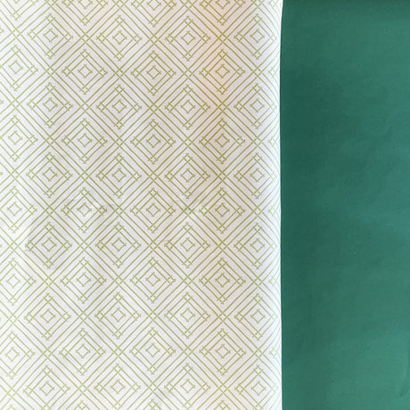 Green gift wrapping paper with a geometric lattice pattern