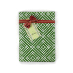 a wrapping paper with a geometric lattice pattern in green