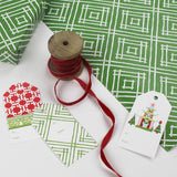 a wrapping paper with a geometric lattice pattern in green