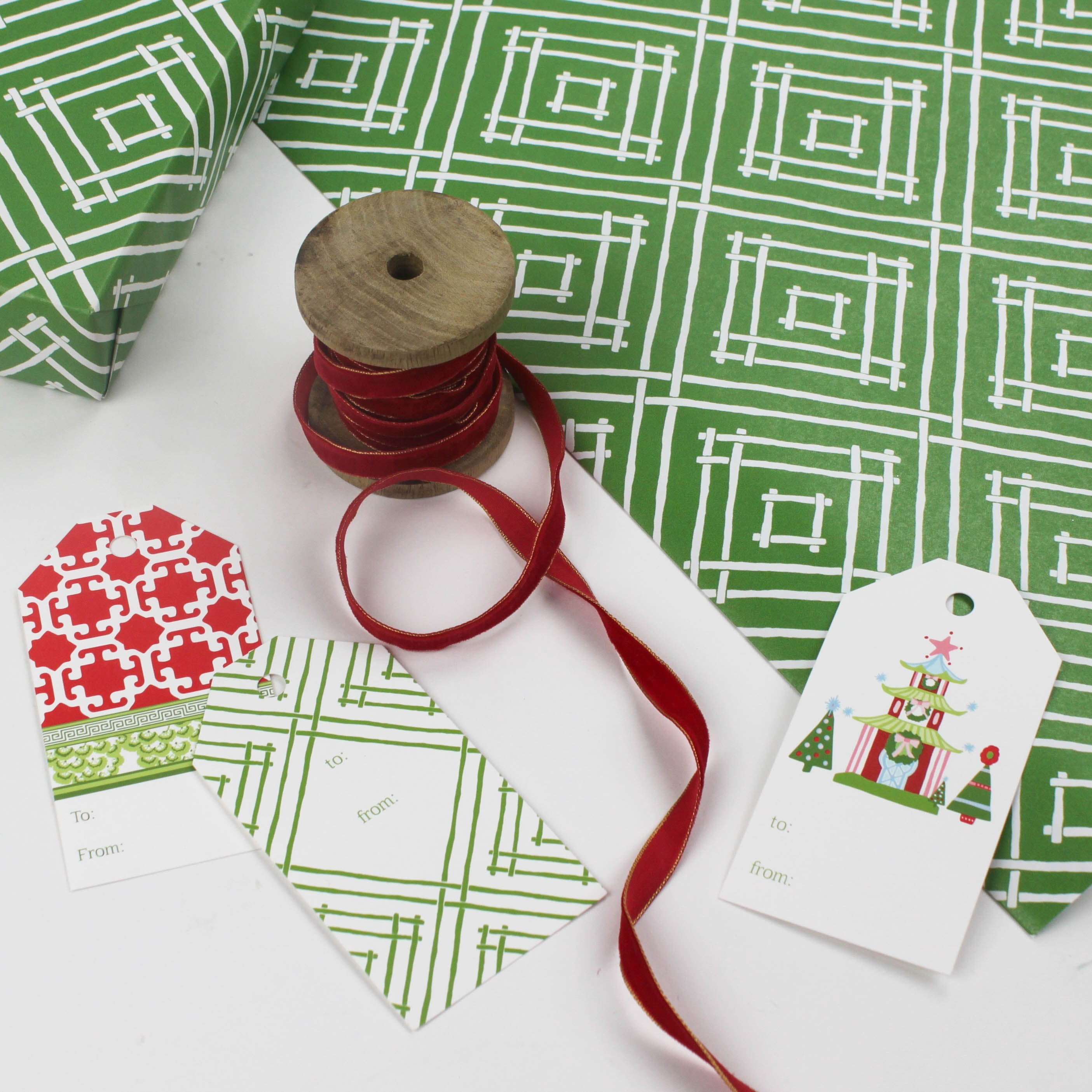 a wrapping paper with a geometric lattice pattern in green