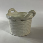 a white vintage italian ceramic basket