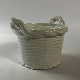 a white vintage italian ceramic basket