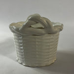 a white vintage italian ceramic basket