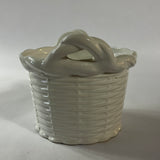 a white vintage italian ceramic basket