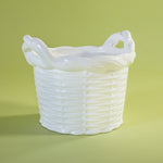 a white vintage italian ceramic basket