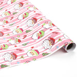 roll of Colorful Christmas wrapping paper featuring santa, candy cane and christmas tree motifs. 