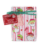 Colorful Christmas wrapping paper featuring santa, candy cane and christmas tree motifs. 