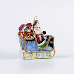 a Santa Sleigh Glass Christmas Ornament
