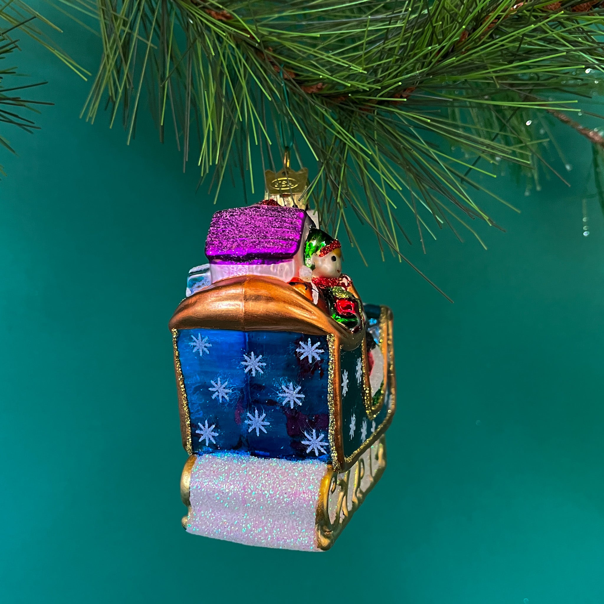 back of a Santa Sleigh Glass Christmas Ornament