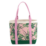 a large Jungle Road canvas tote bag with a pink and green leaf pattern, displayed against a white background.