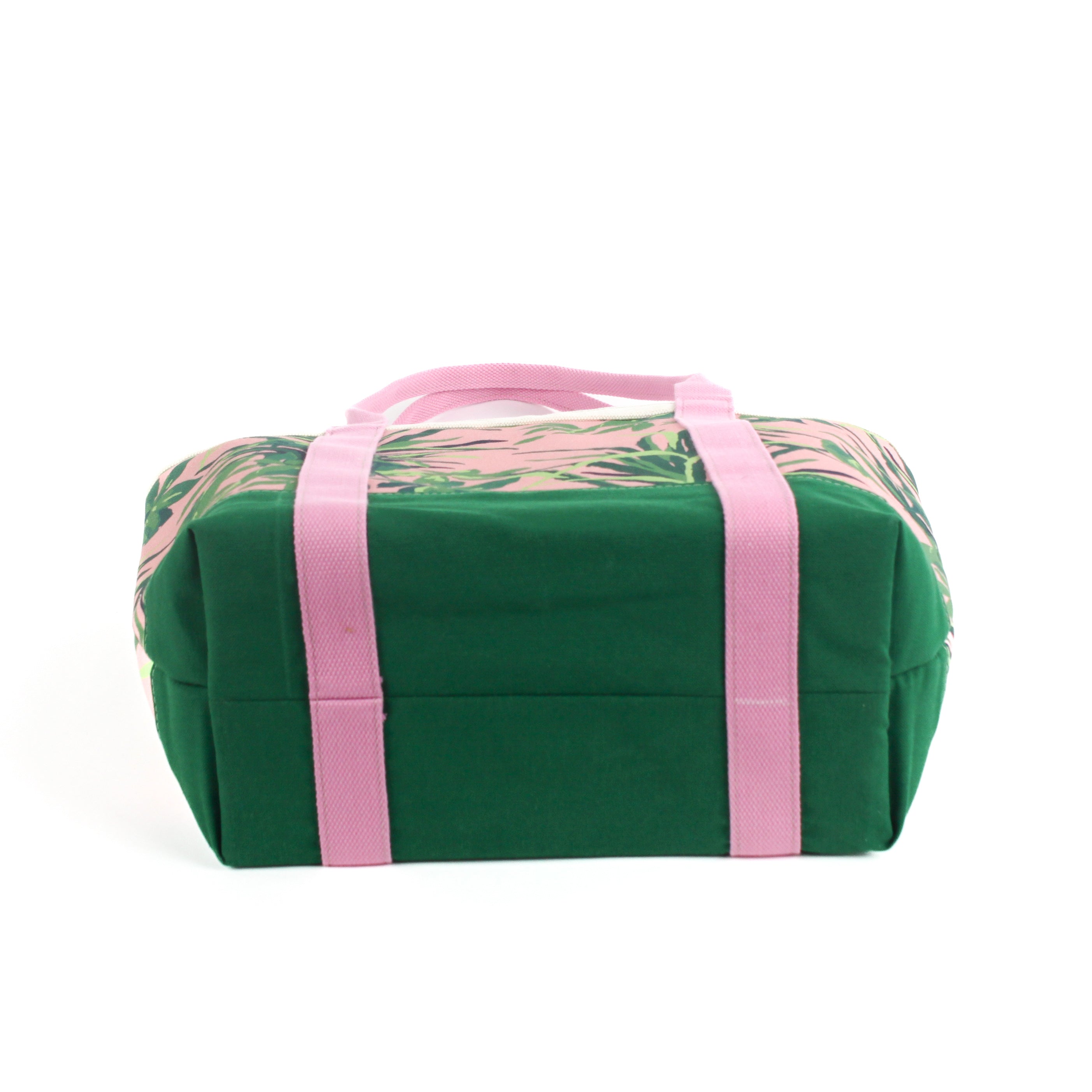 the image shows the bottom of a large Jungle Road canvas tote bags with a pink and green leaf pattern, displayed against a white background.