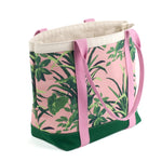a large Jungle Road canvas tote bags with a pink and green leaf pattern, displayed against a white background.