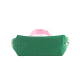 bottom of a a small Jungle Road canvas tote bags with a pink and green leaf pattern, displayed against a white background.