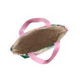 the image shows the inside of a large Jungle Road canvas tote bags with a pink and green leaf pattern, displayed against a white background.
