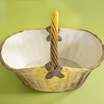 Large brown ceramic basket with woven texture and curved handle
