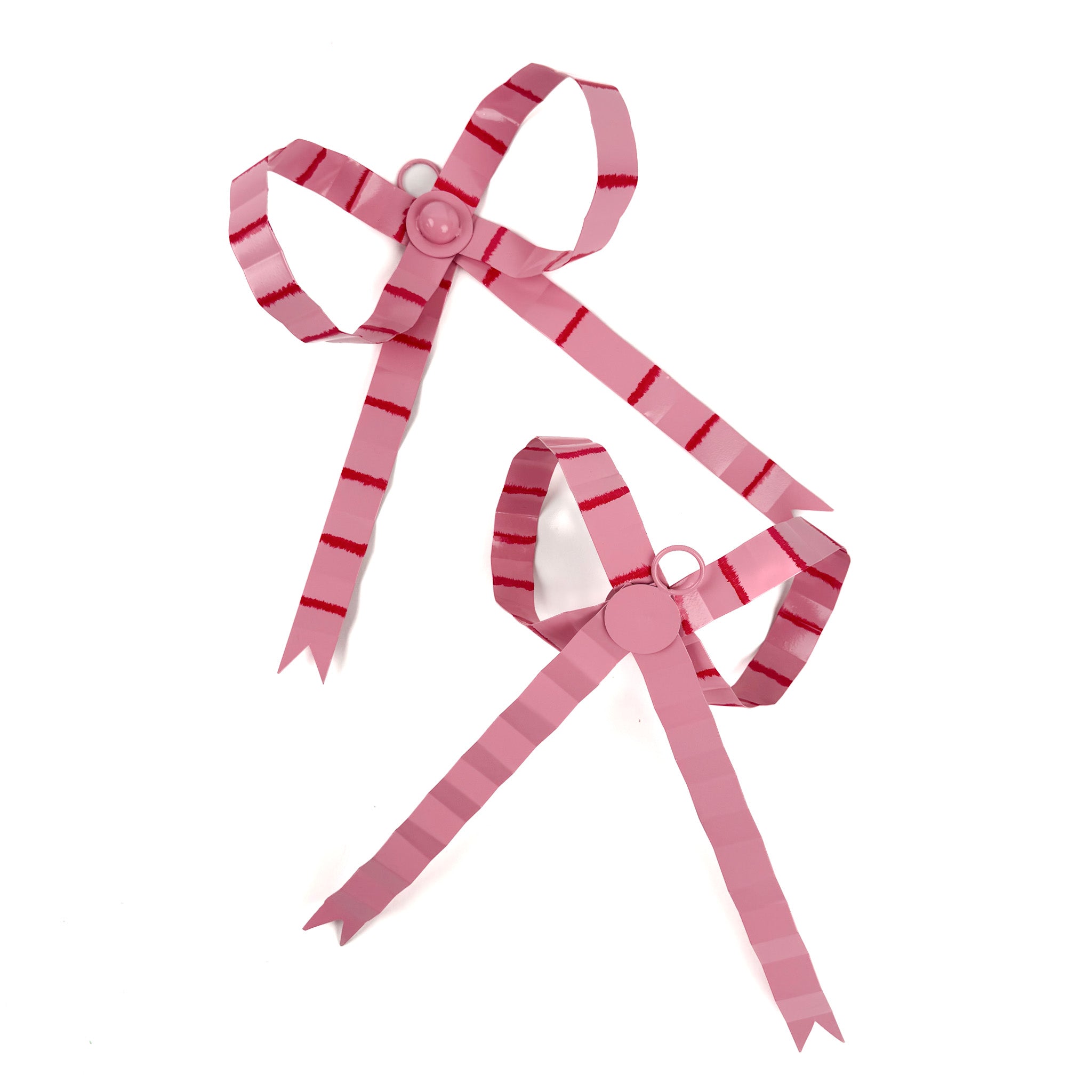 pair of large pink striped bow ornaments with long ribbon tails