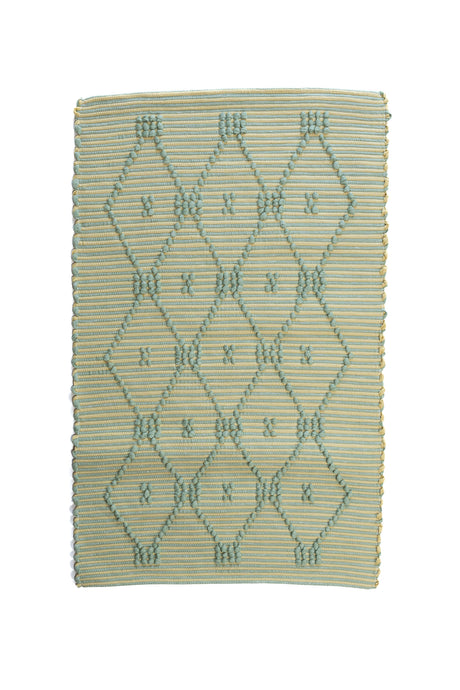 A madcap cottage yellow and green striped accent rug with a lattice motif across the front