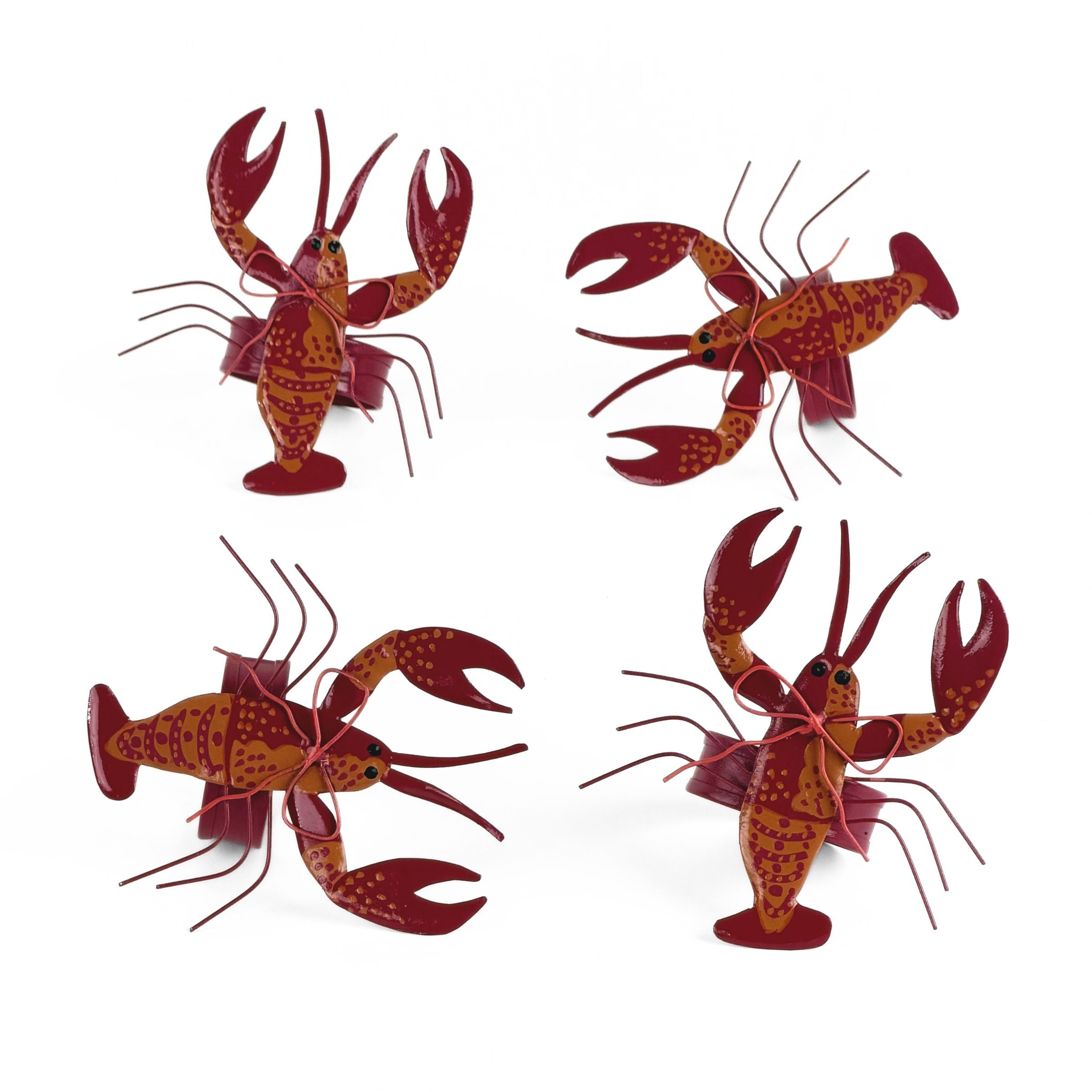 Set of red lobster napkin rings featuring detailed coastal-inspired lobster designs.