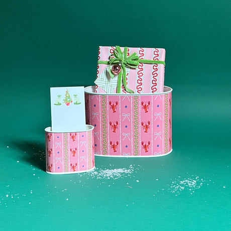 Lobster and Ribbons filled duo of caddies in large and small on a green background