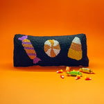Madcap Cottage Black Hallowen throw Pillow with three Halloween candy motifs