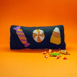 Madcap Cottage Black Hallowen throw Pillow with three Halloween candy motifs