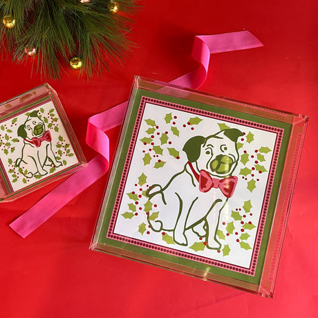 Pug in middle with holly around Square Christmas Acrylic Tray in 3 Sizes.  Pug has a bowtie of red and pink, border around the edge is green, pink, with red dots.