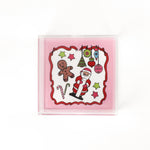 Square acrylic tray with Santa & Friends, stars, ornaments, and candy canes on white background with pink and red border.