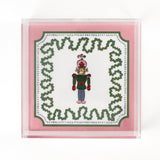 Nutcracker Square Acrylic Tray with in medium size with pink and green border and Nutcracker in the center.