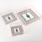 Nutcracker Square Acrylic Tray with in 3 sizes with pink and green border and Nutcracker in the center.