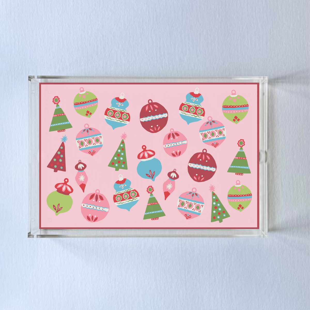 Ornaments Rectangular Acrylic Tray, in 2 sizes. Pink background with many bright colored ornaments and a red border.